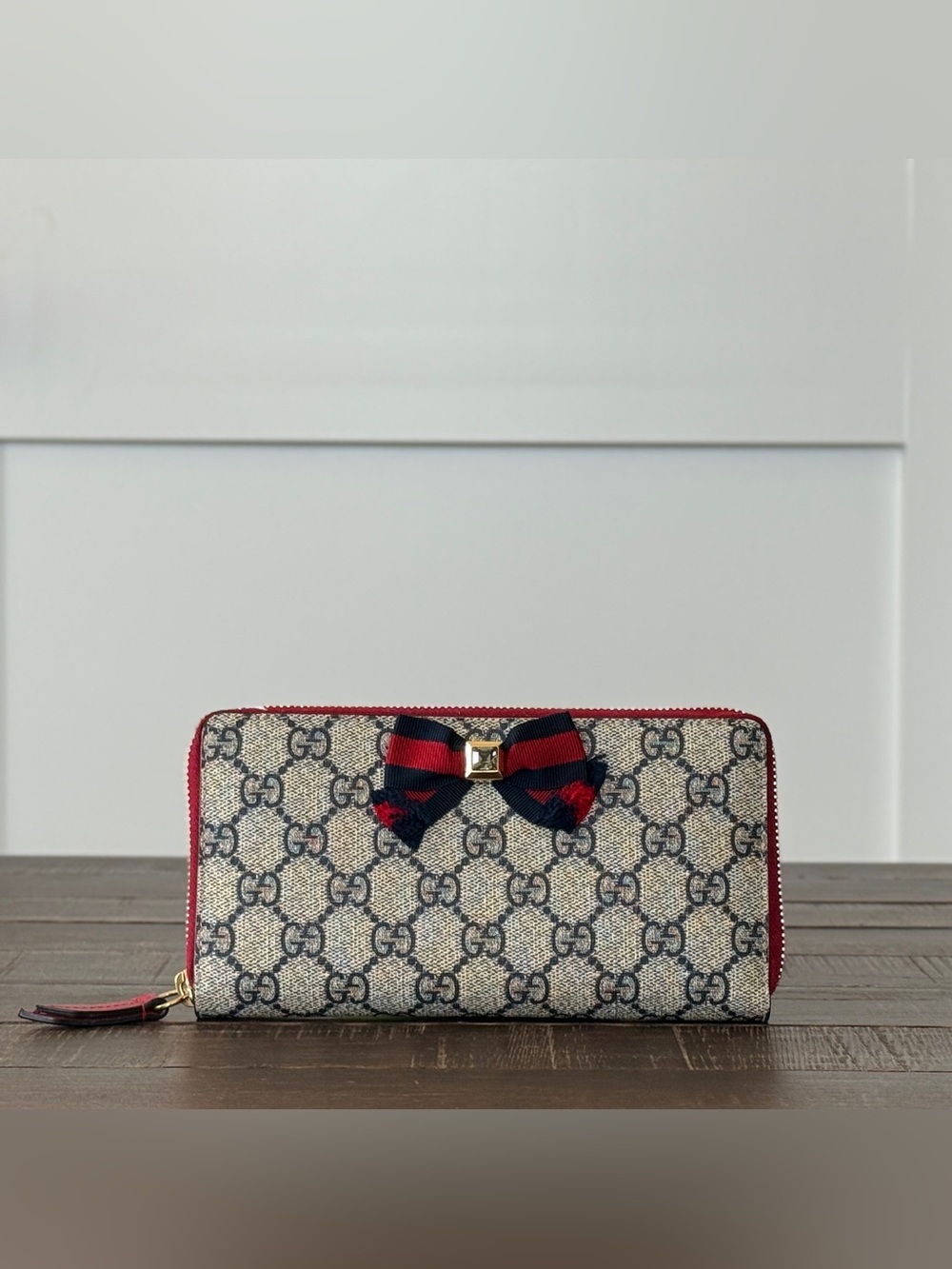 Gucci Beige GG Supreme Zip Around Wallet with Red Trim and Navy-Red Bow